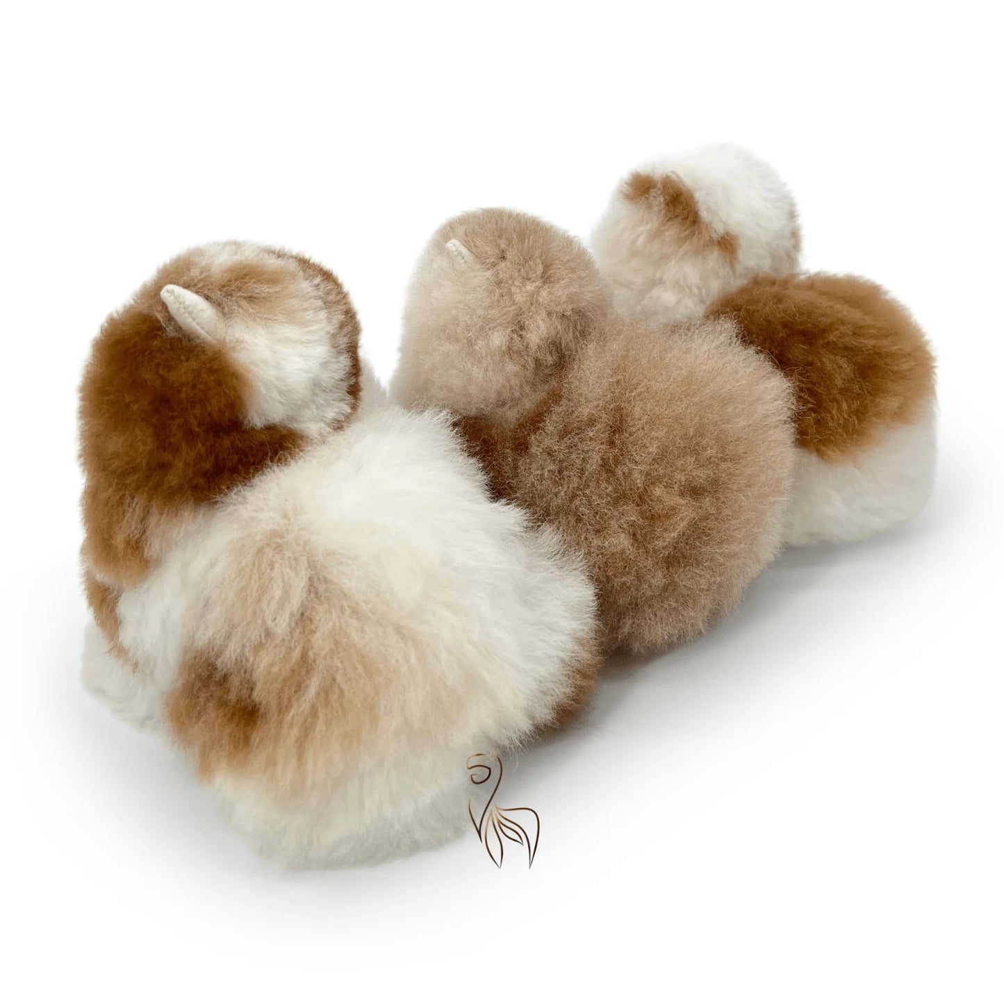 Maple Syrup INKARI Limited Edition alpaca stuffed animal — lifestyle view in cozy home setting